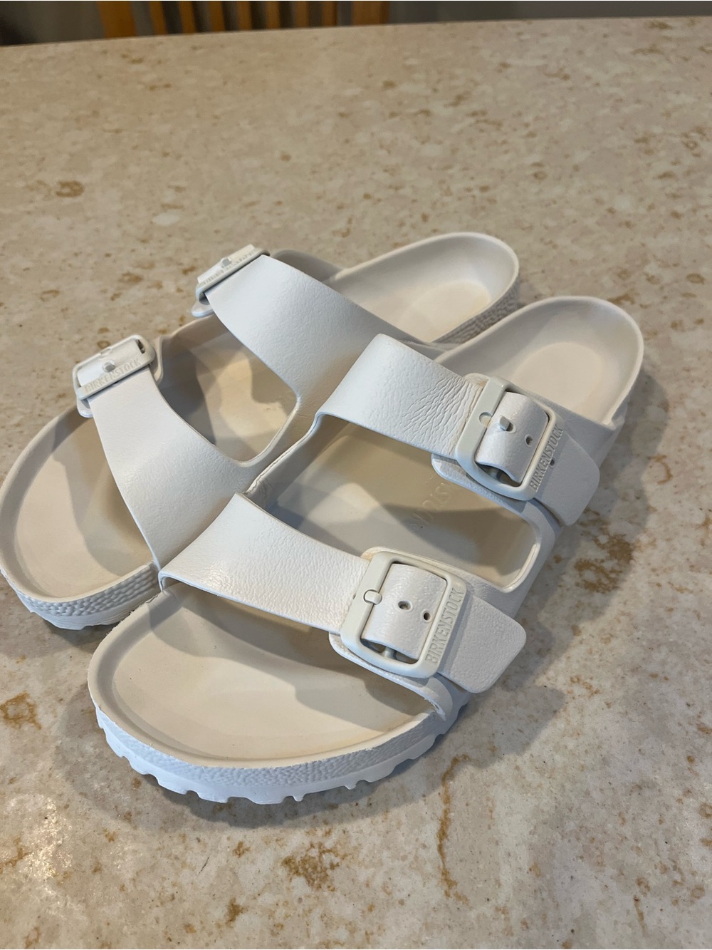 Authentic Birkenstock Arizona Essentials EVA sandals in classic white